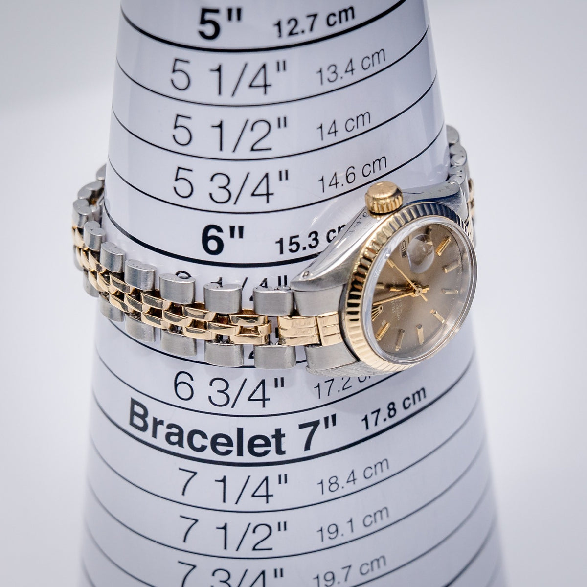 Rolex Date 6917 Steel & Yellow Gold Champagne Stick Dial – detail