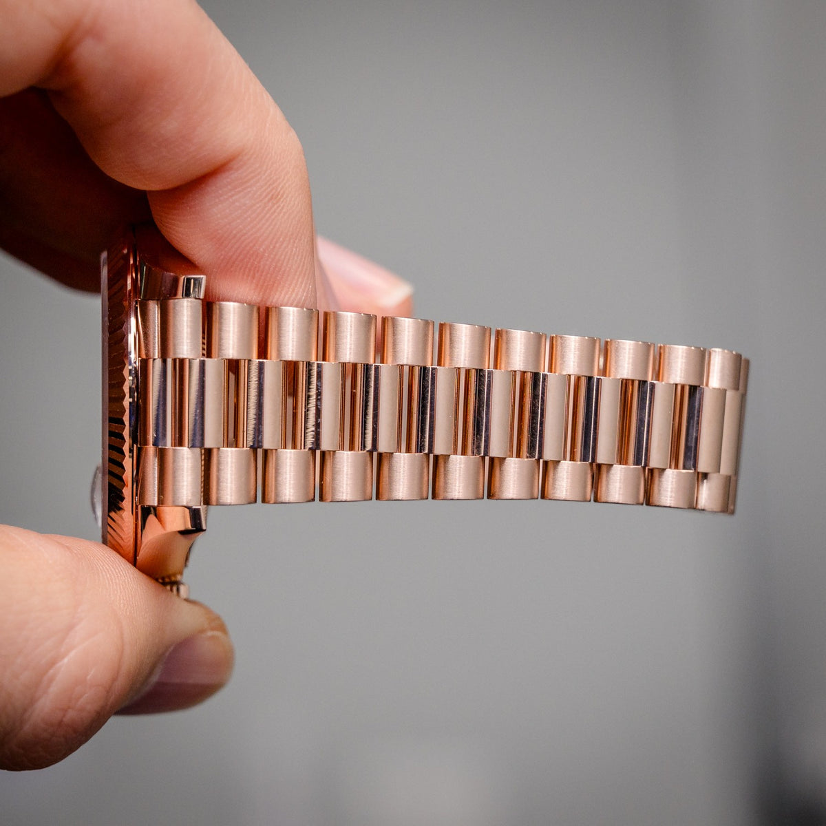 Rolex Day-Date 228235 Rose Gold Sundust Roman Dial – box & papers