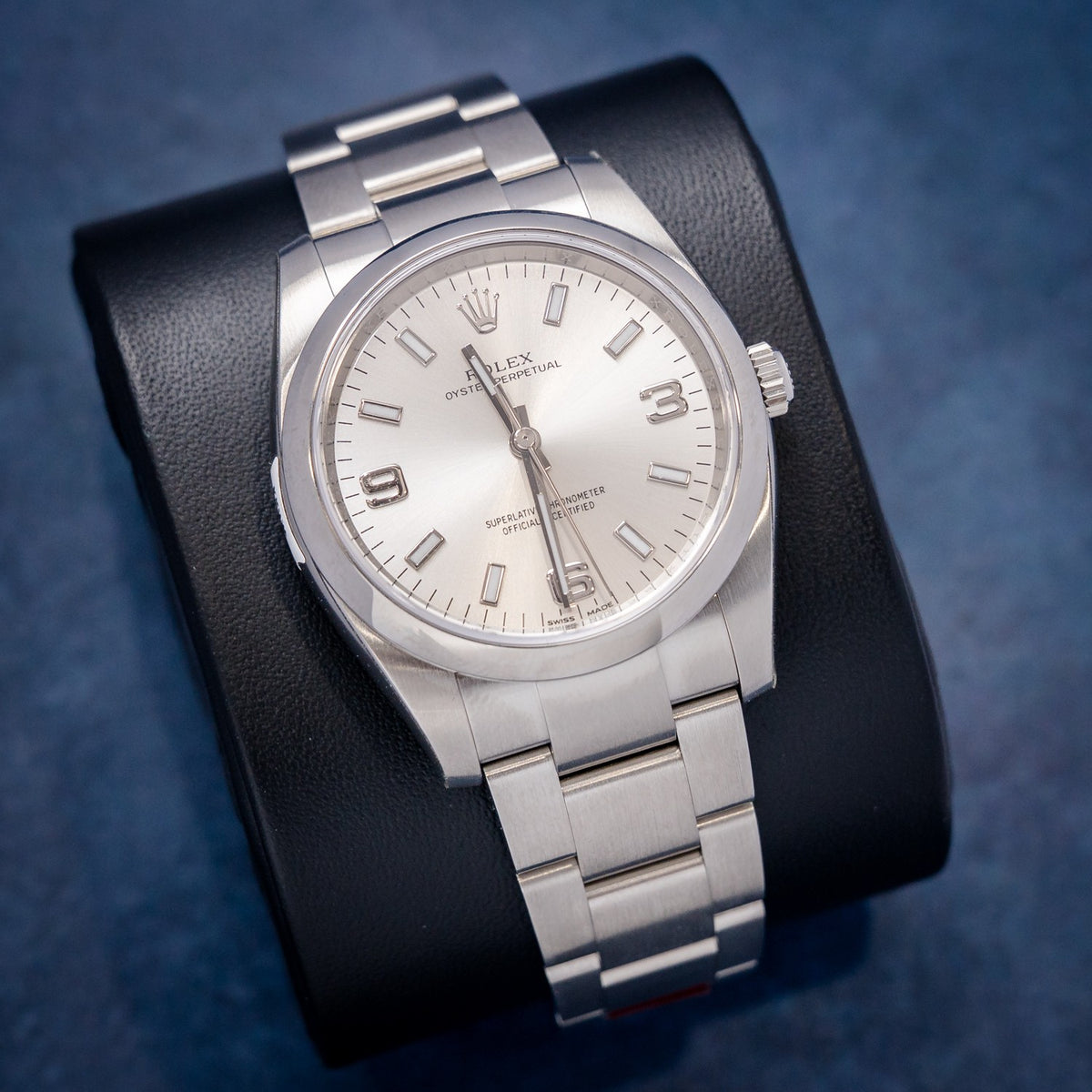 Rolex Oyster Perpetual 114200 Steel Silver Arabic Numerals Dial – dial close-up