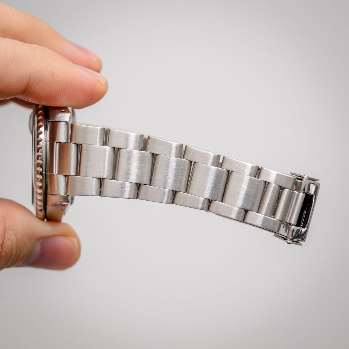 Rolex Submariner Date 16610-HOLES Steel – side